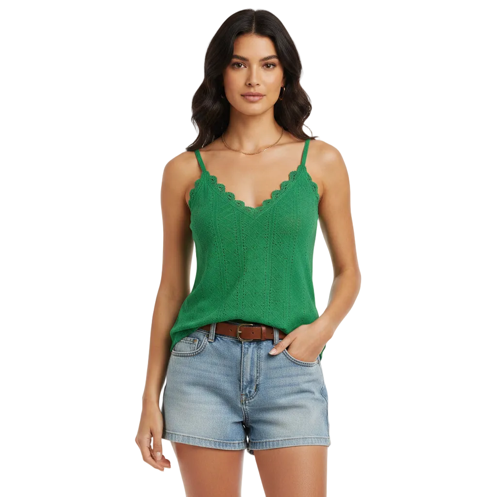Close-up of lace detail on green sleeveless blouse