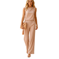 Close-up of elegant design details on pink jumpsuit