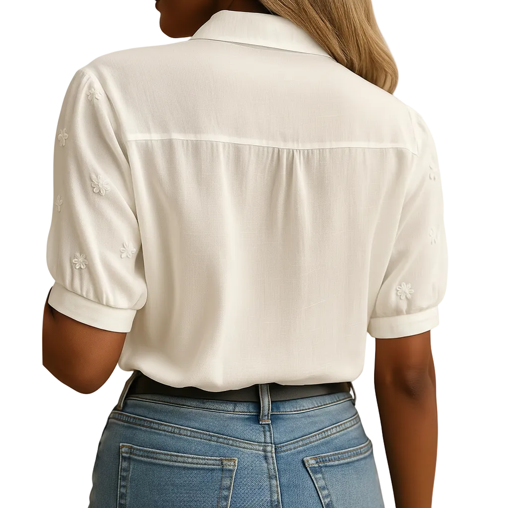 Side profile of white tailored blouse